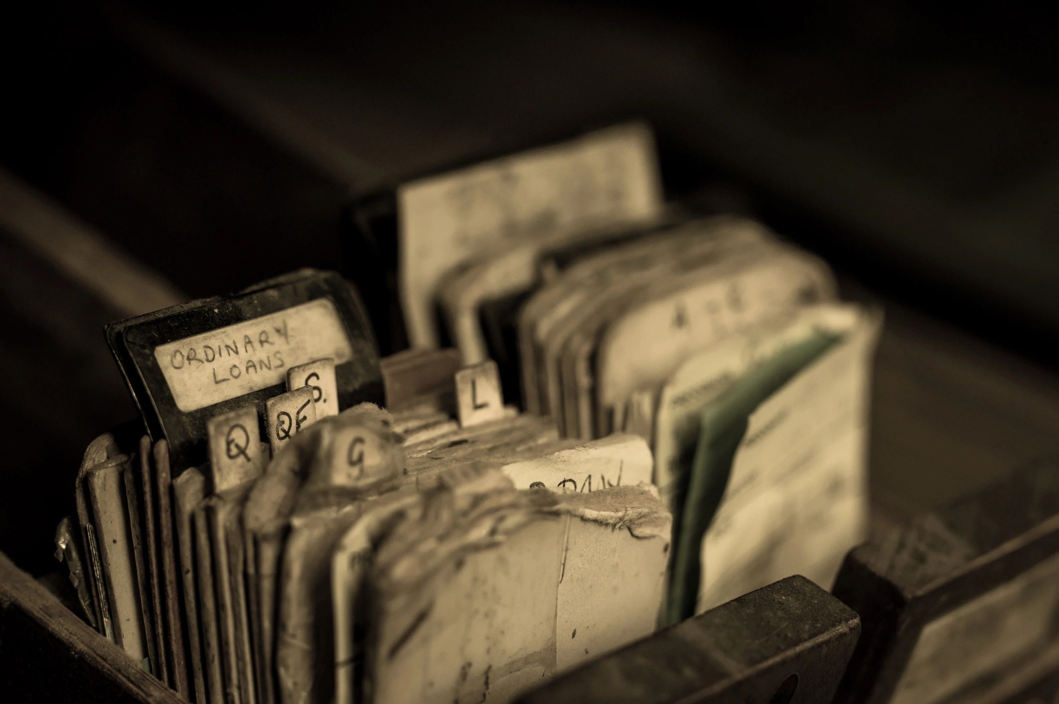 Library card catalogue index cards representing archival research